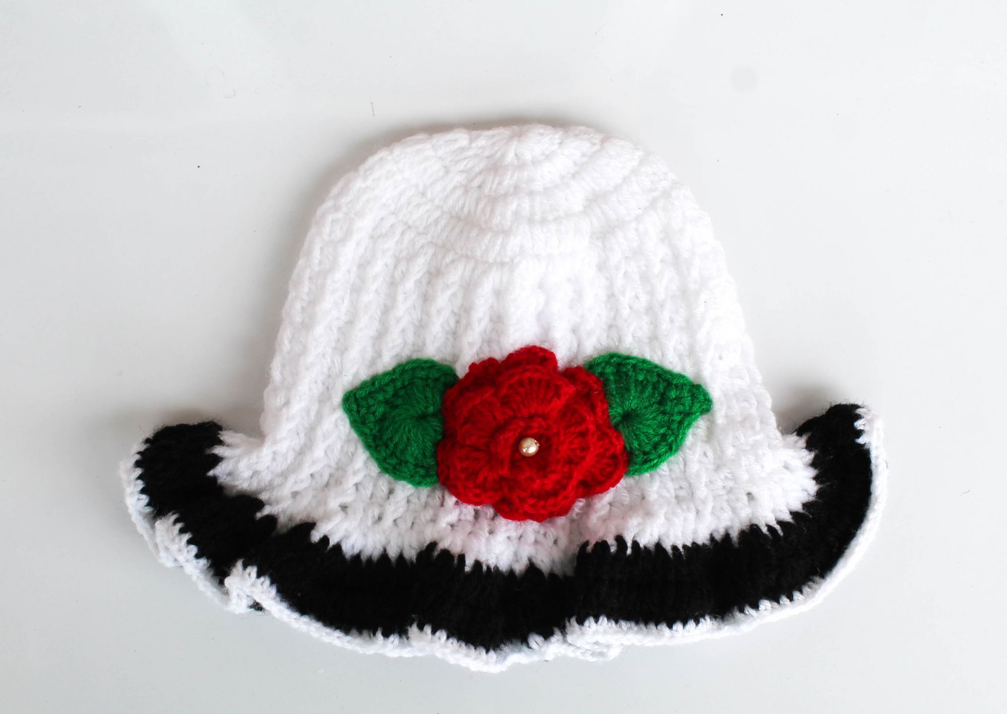 White and Black Floral Woolen Cap for Infants