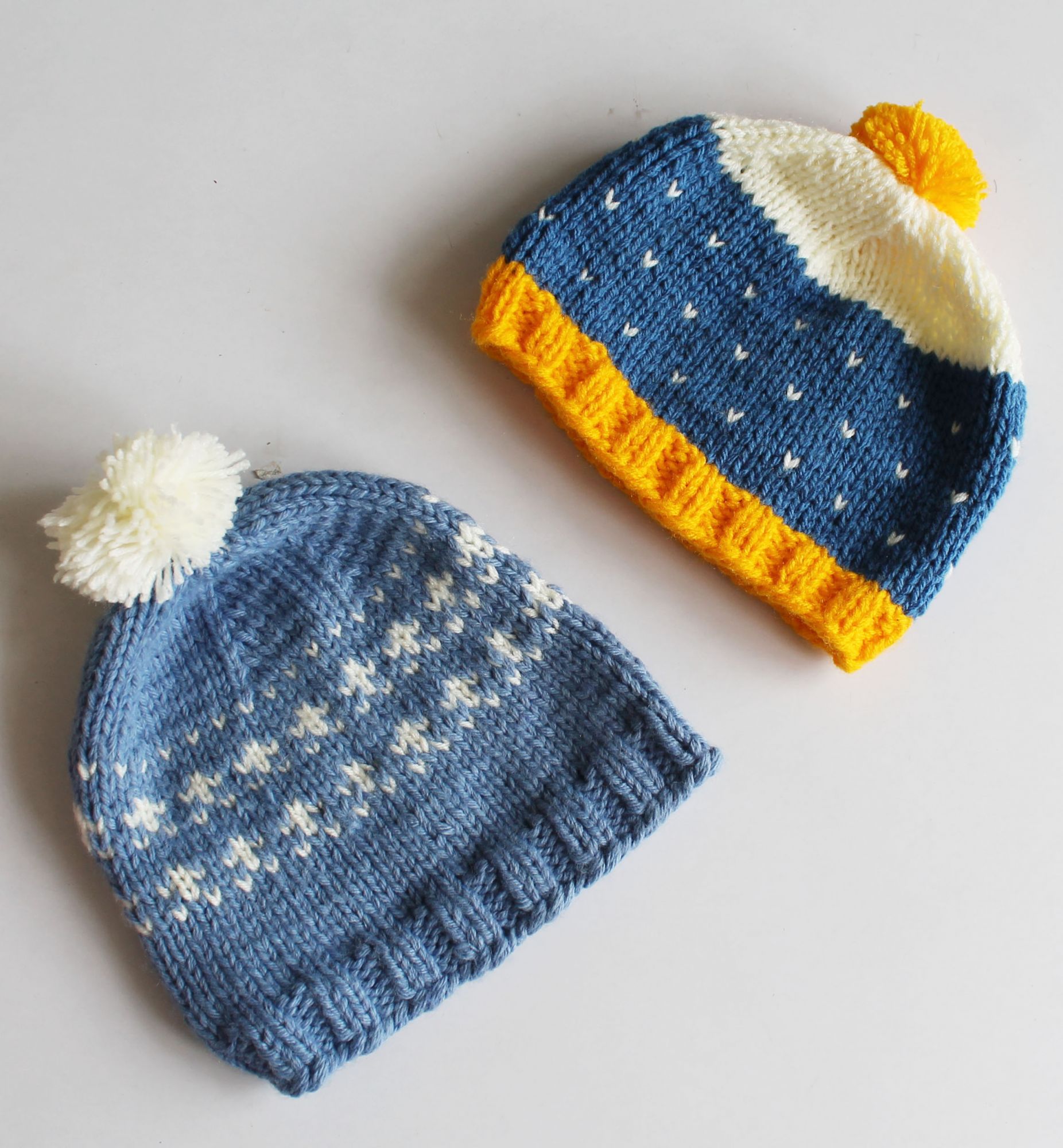 Woonie Hearts Knitted Pom Pom Detailing Handmade Woollen Caps Pack Of 2 - Light Blue And Blue