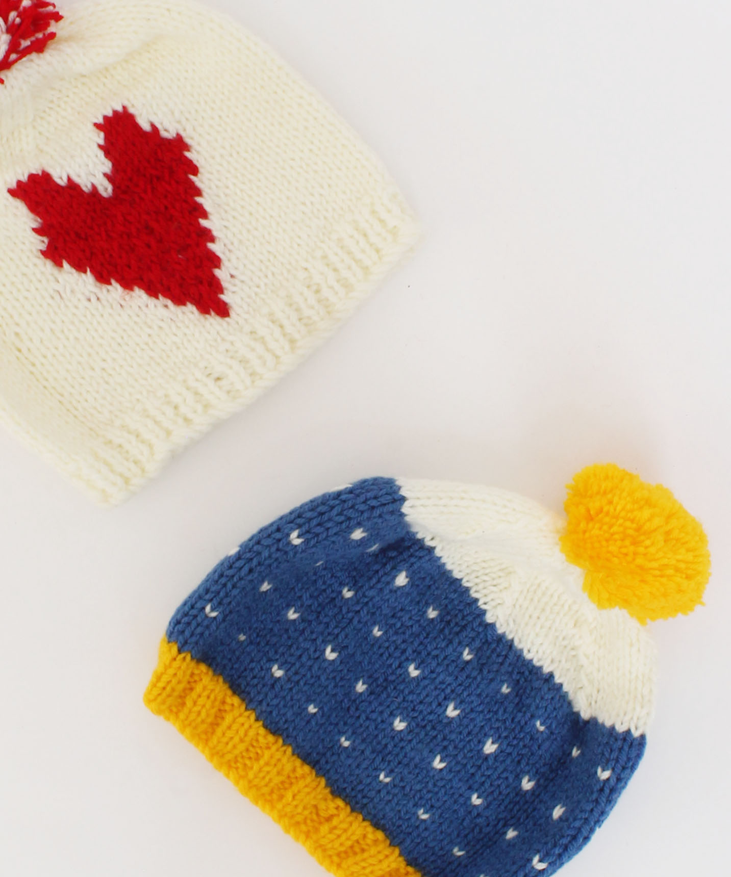 Handmade Knitted Embroidered & Heart Design Caps Pack Of 2-Cream & Blue