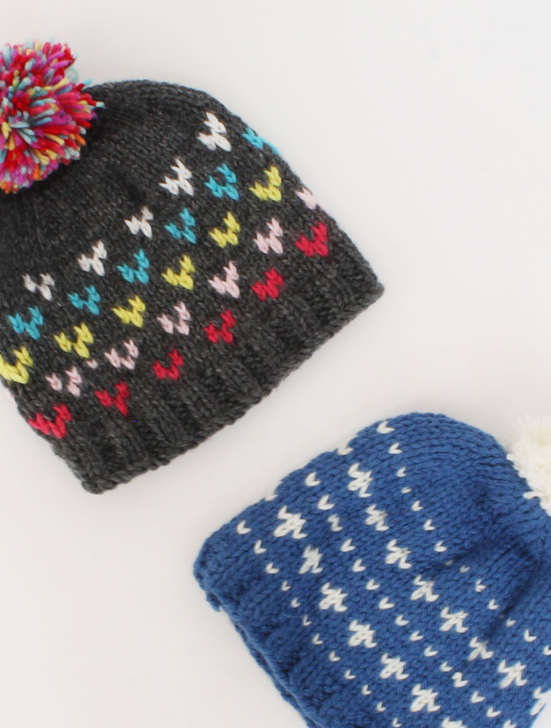 Handmade Knitted Embroidered Pom Pom Detailing Caps Pack Of 2-Grey & Blue