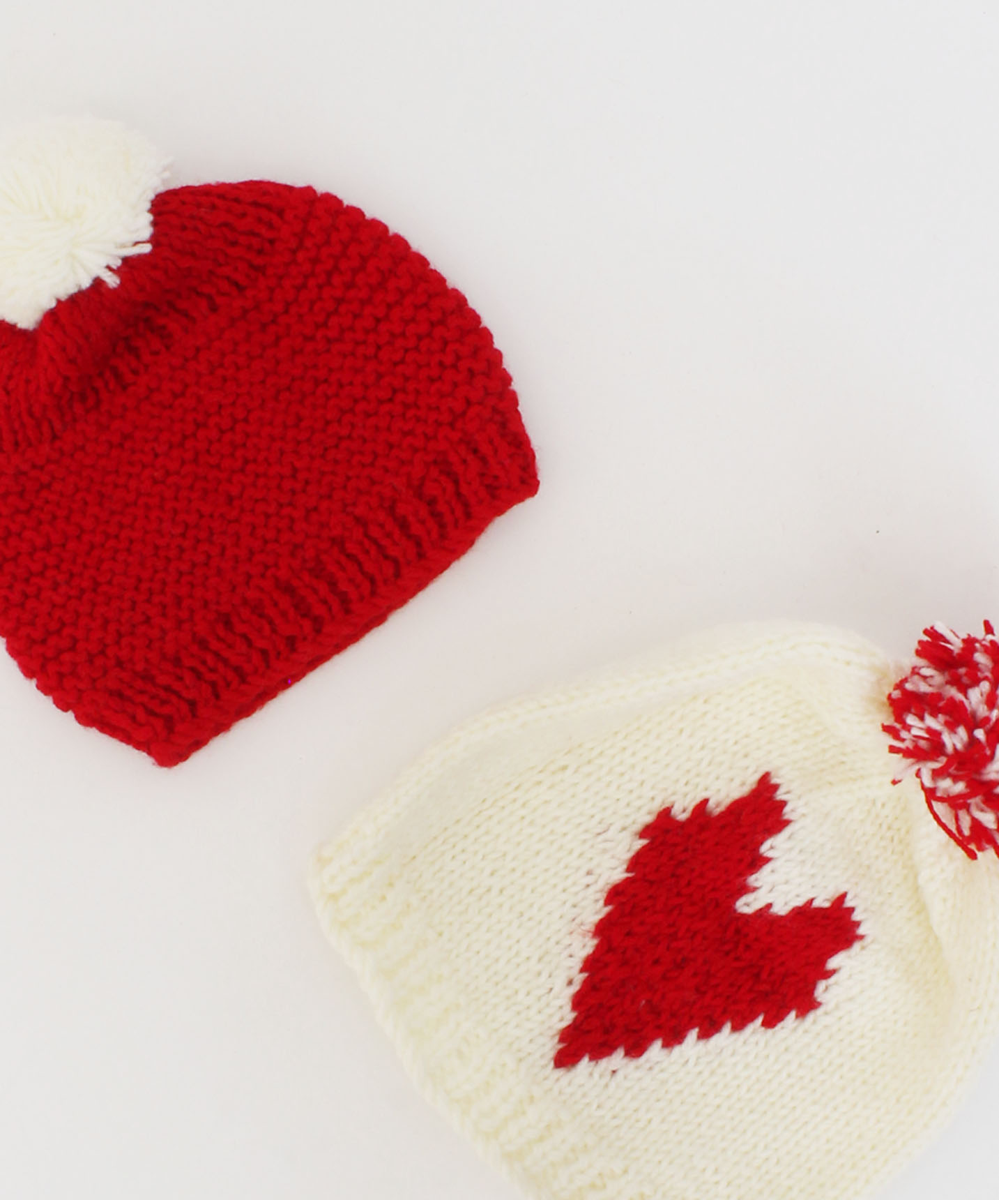 Handmade Knitted Heart & Pom Pom Detailing Caps Pack Of 2-Red & Cream
