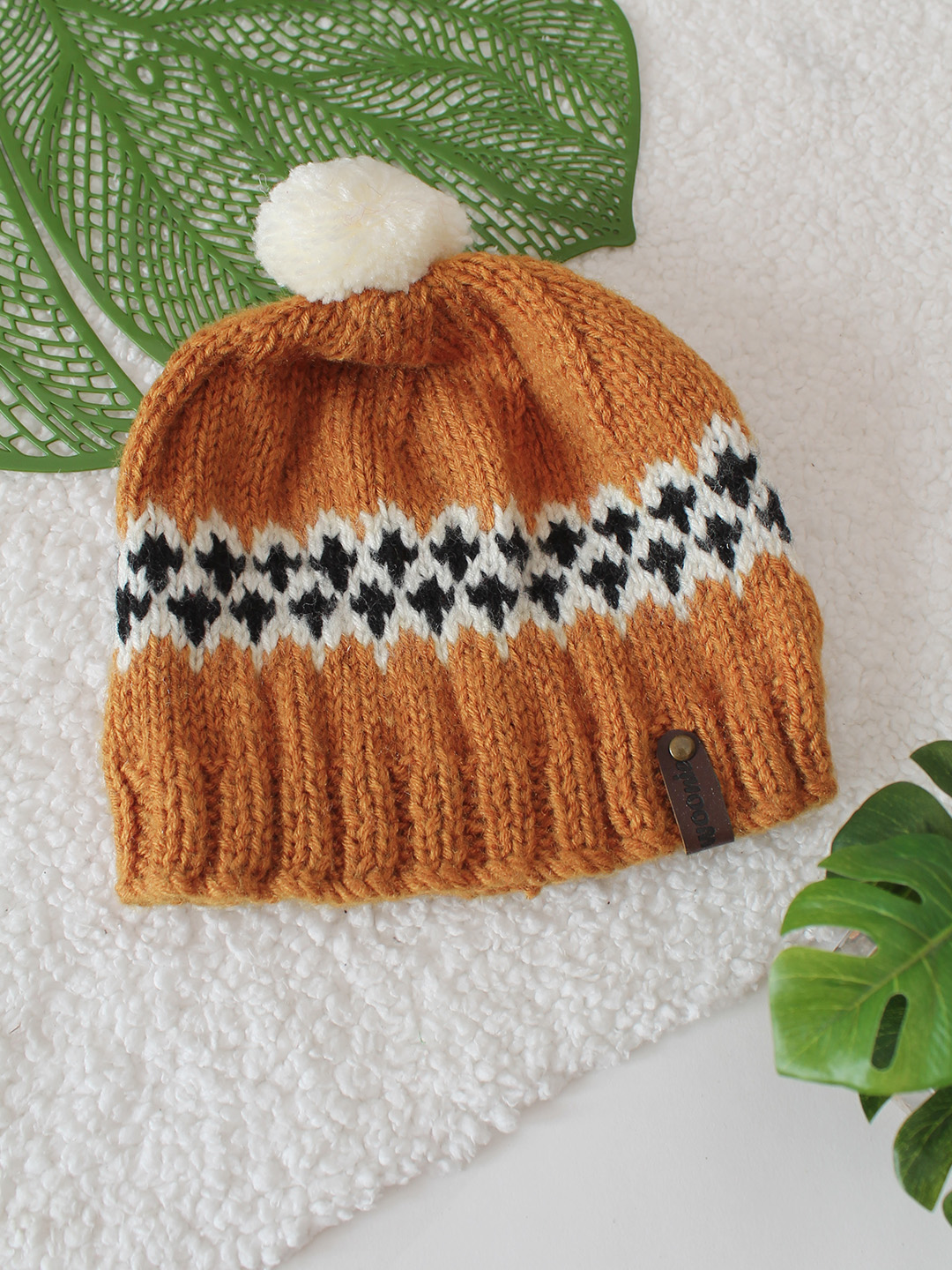 Handknitted Self Design Pom Pom Detailed Cap - Mustard