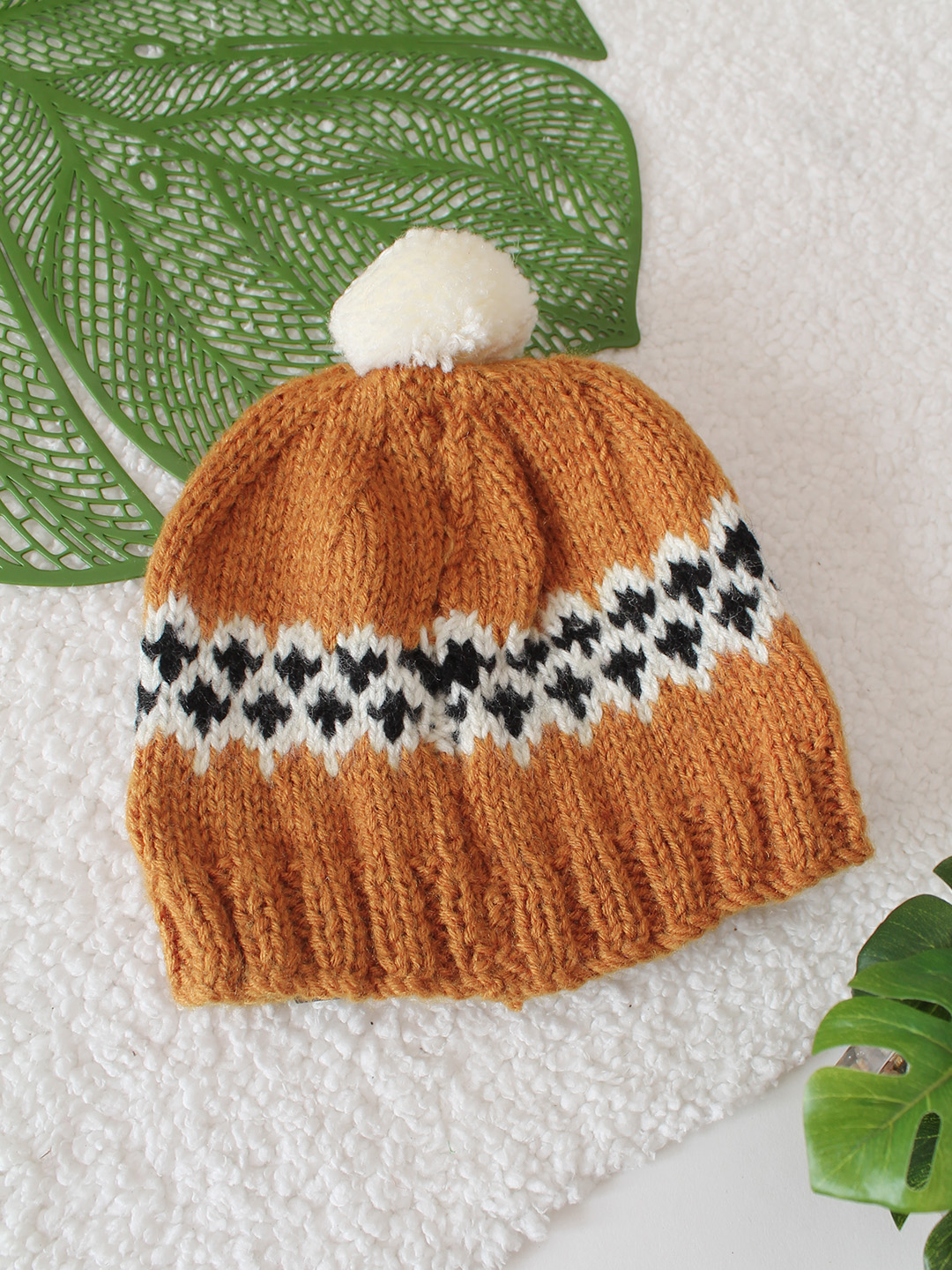 Handknitted Self Design Pom Pom Detailed Cap - Mustard
