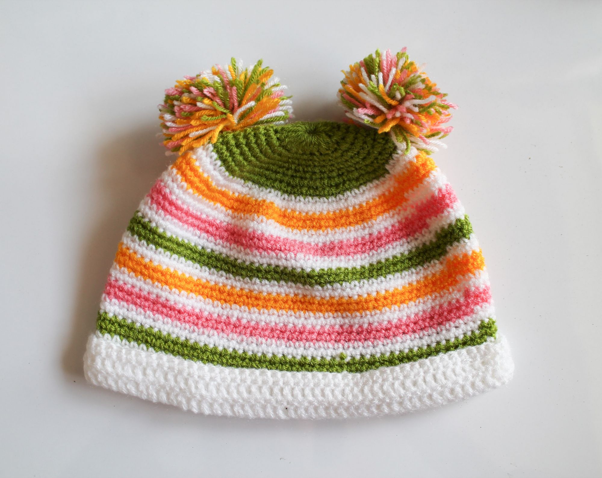 Woonie HandmadeMulticolored Pom-Pom Cap