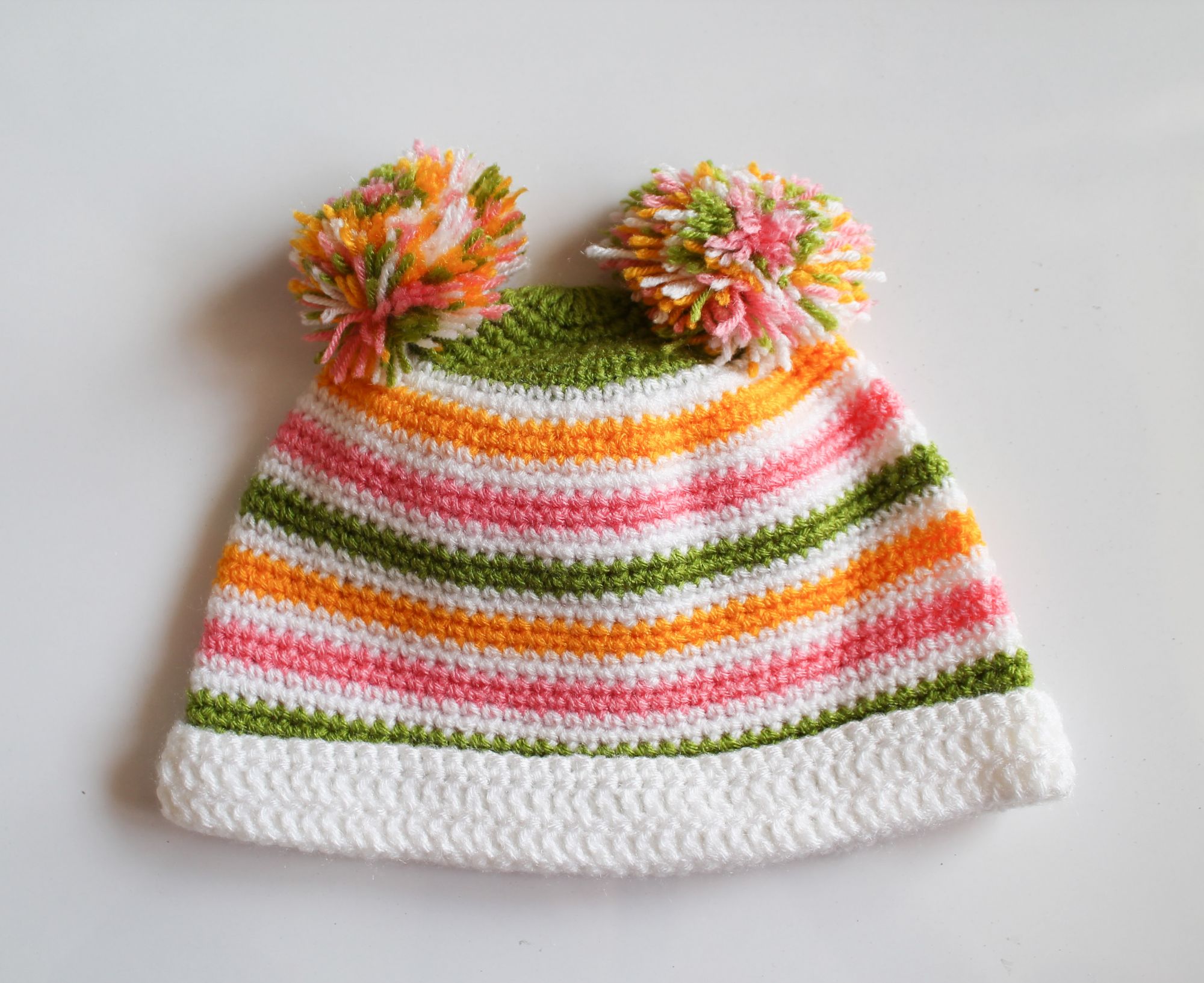 Woonie HandmadeMulticolored Pom-Pom Cap