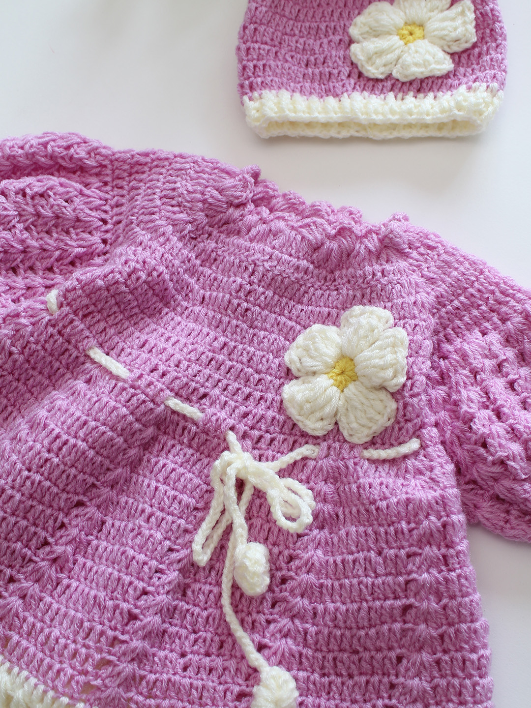 Woonie Hand Knitted Puff Sleeves Daisy Floral Frock with Matching Cap - Purple