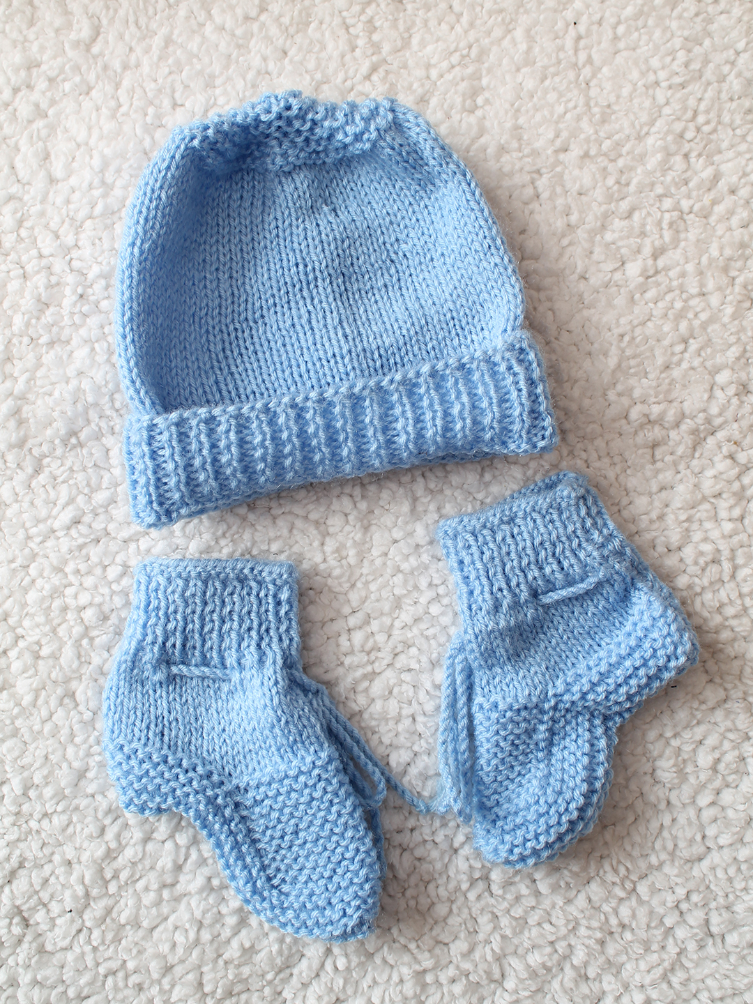 Woonie HandKnitted Full Sleeves Floral Applique Cardigan With Cap and Socks - Sky Blue