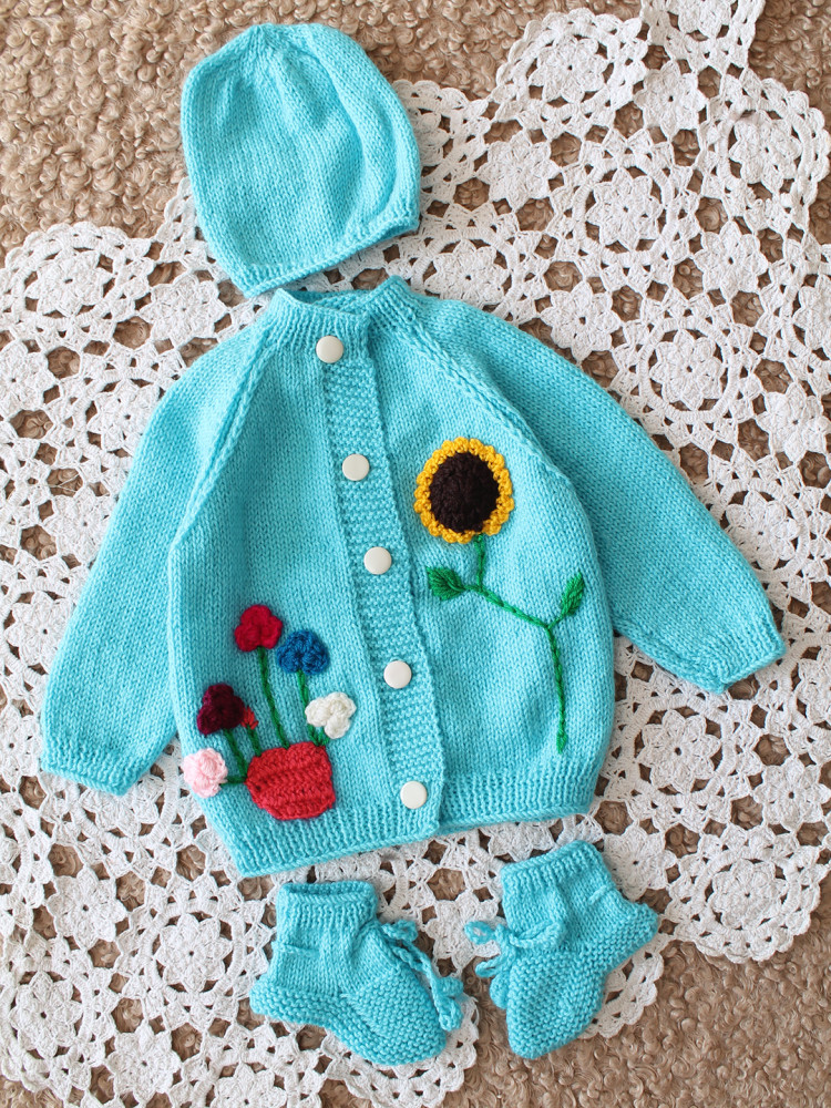 Image of Woonie Handknitted Full Sleeves Floral Applique Cardigan Set with Cap and Booties  - Light Blue