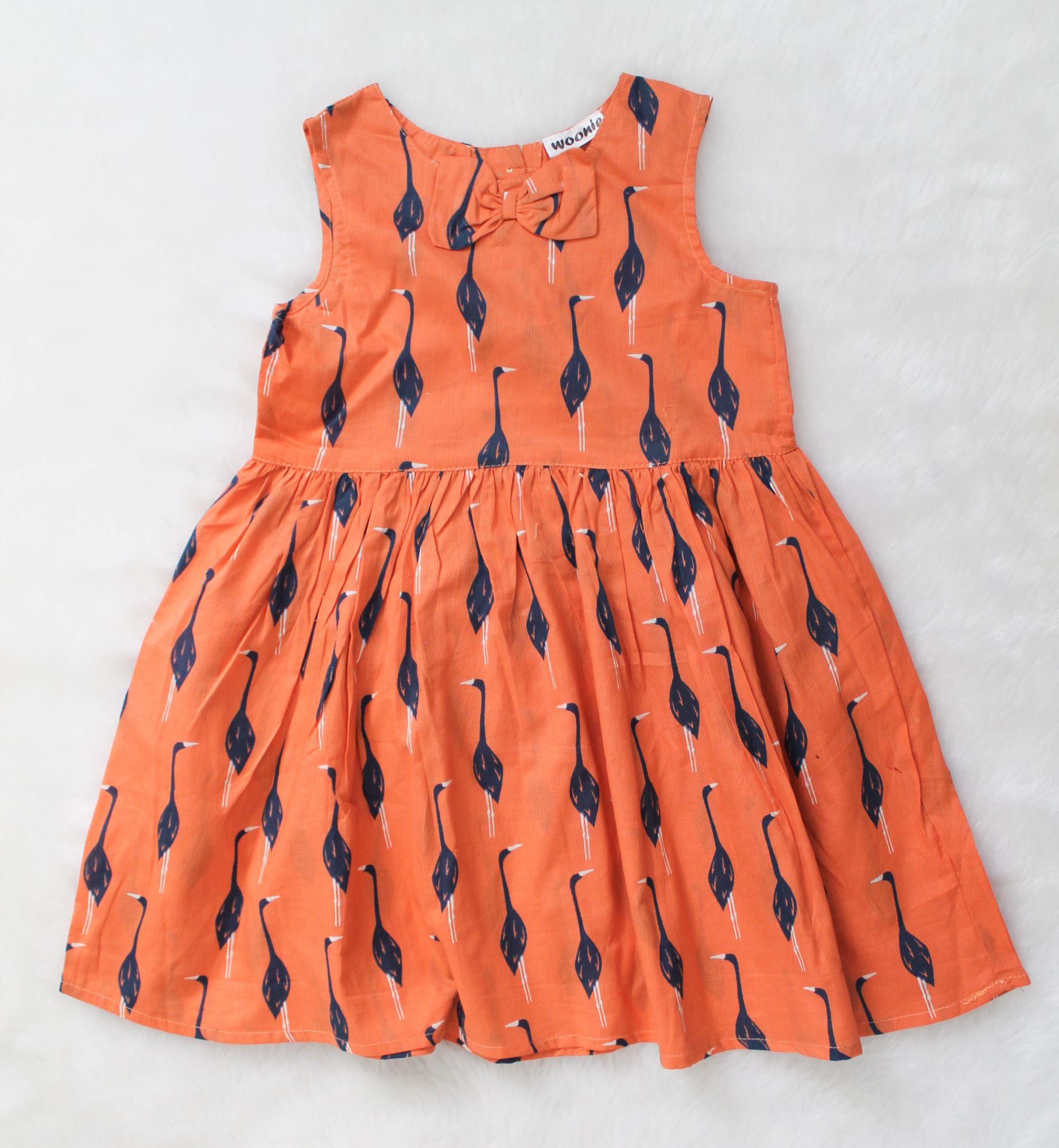 Woonie Sleeveless Swan Printed Frock-Orange