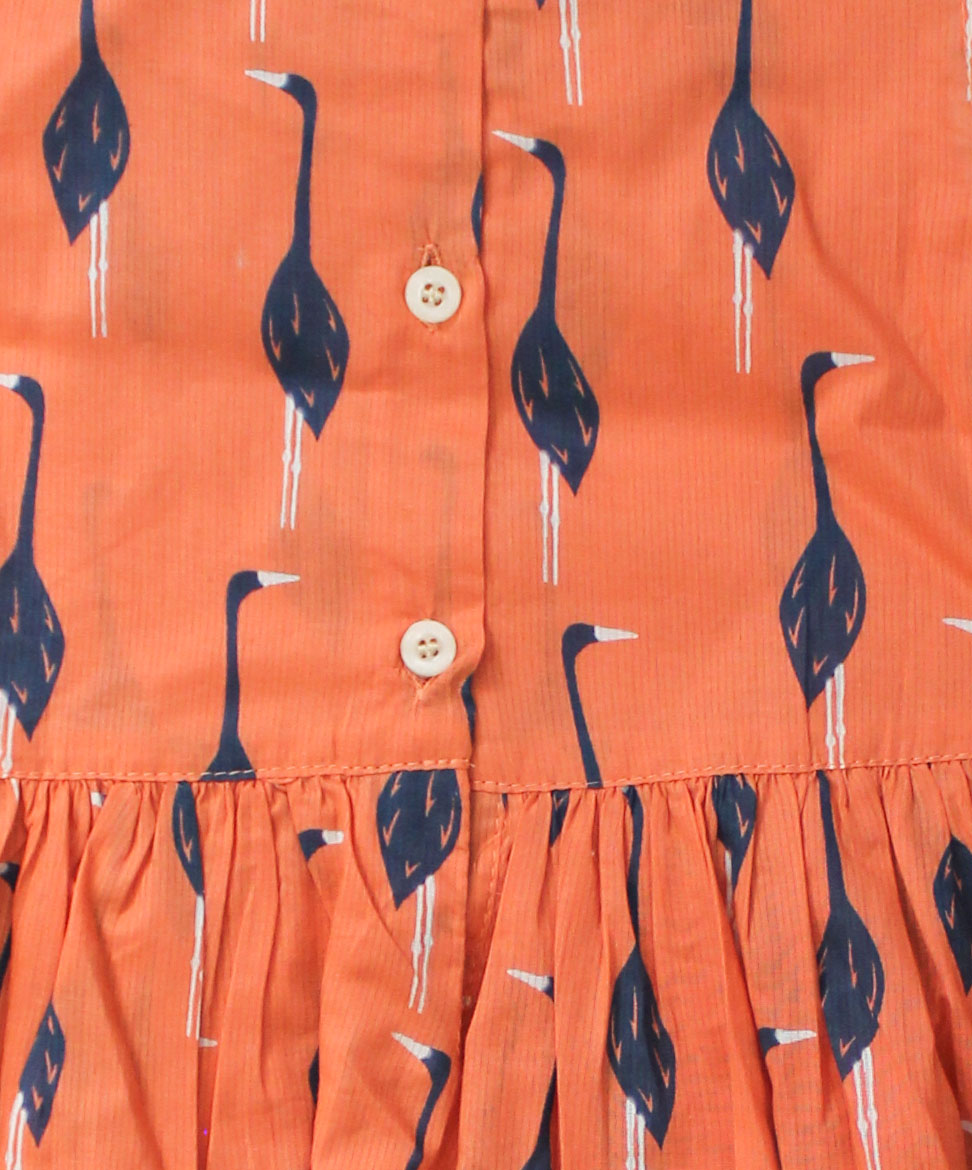Woonie Sleeveless Swan Printed Frock-Orange