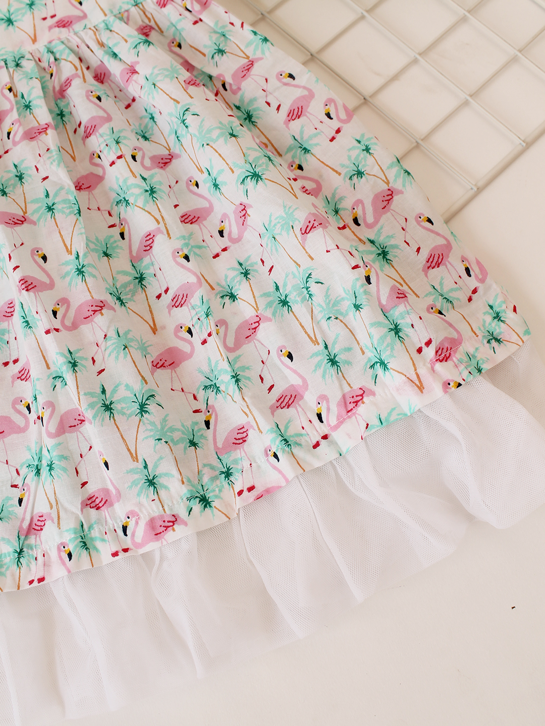 Woonie Sleeveless Swan Printed Frock - Green