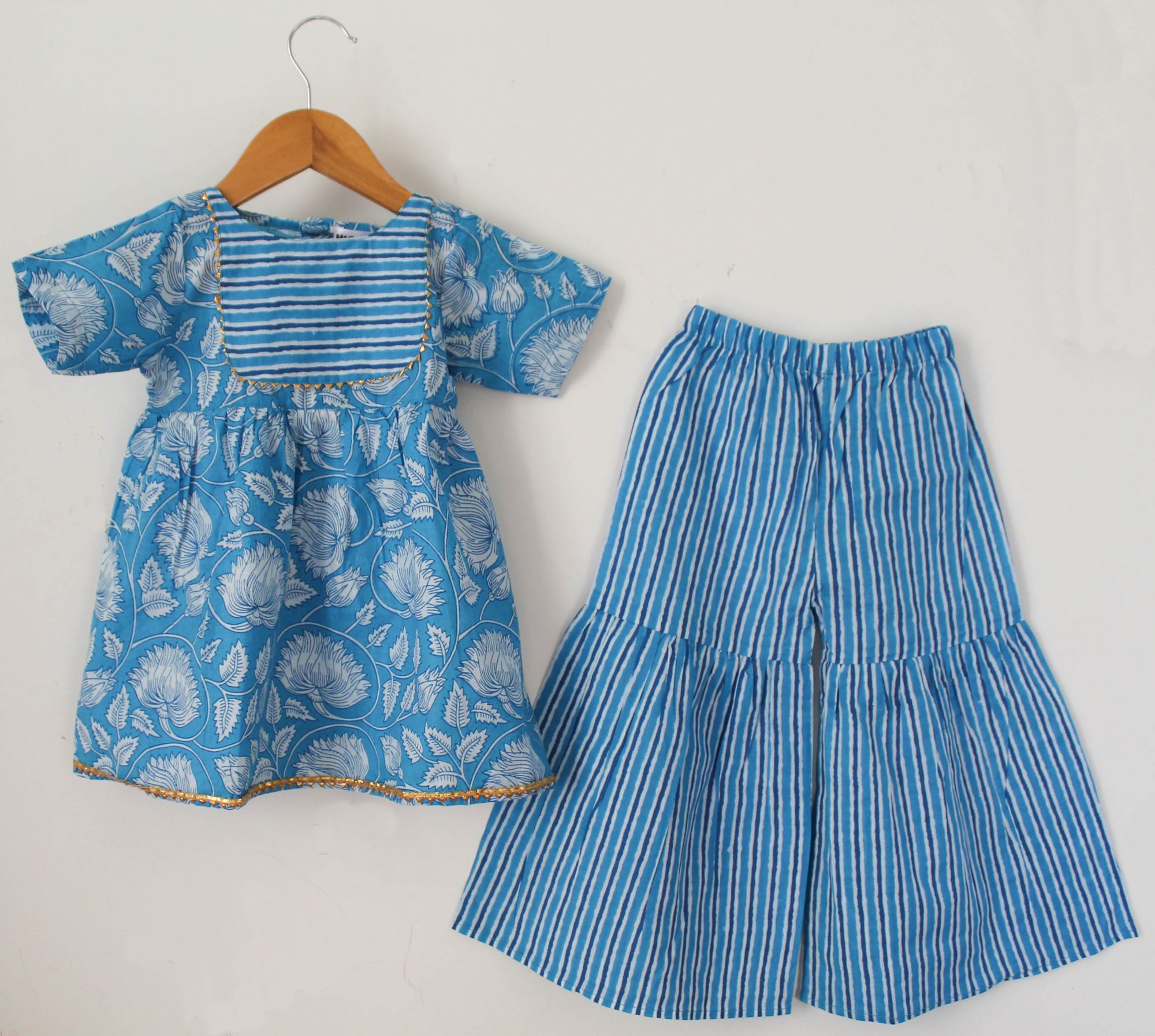 Woonie Half Sleeves Floral Print Kurti With Stripped Pattern Sharara- Blue