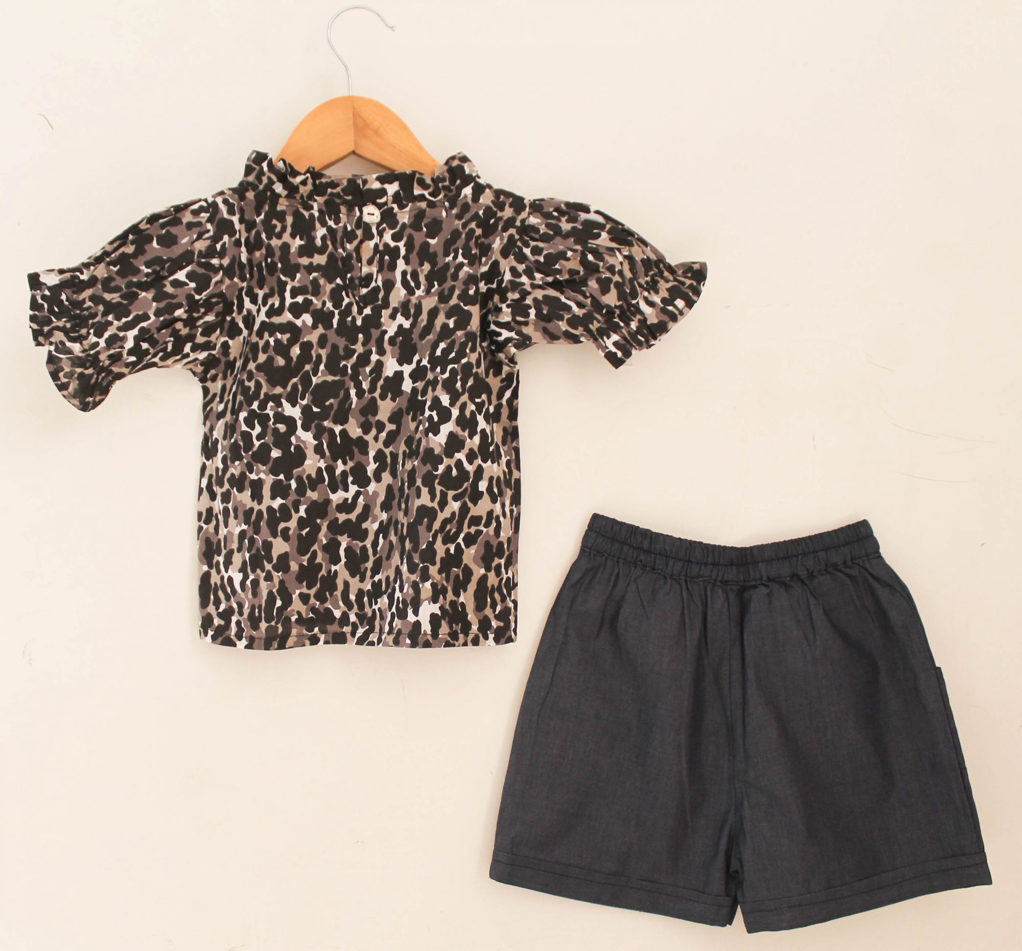 Woonie Half Sleeves Animal Print Rufflle Detail Top & Solid Shorts Set-Black