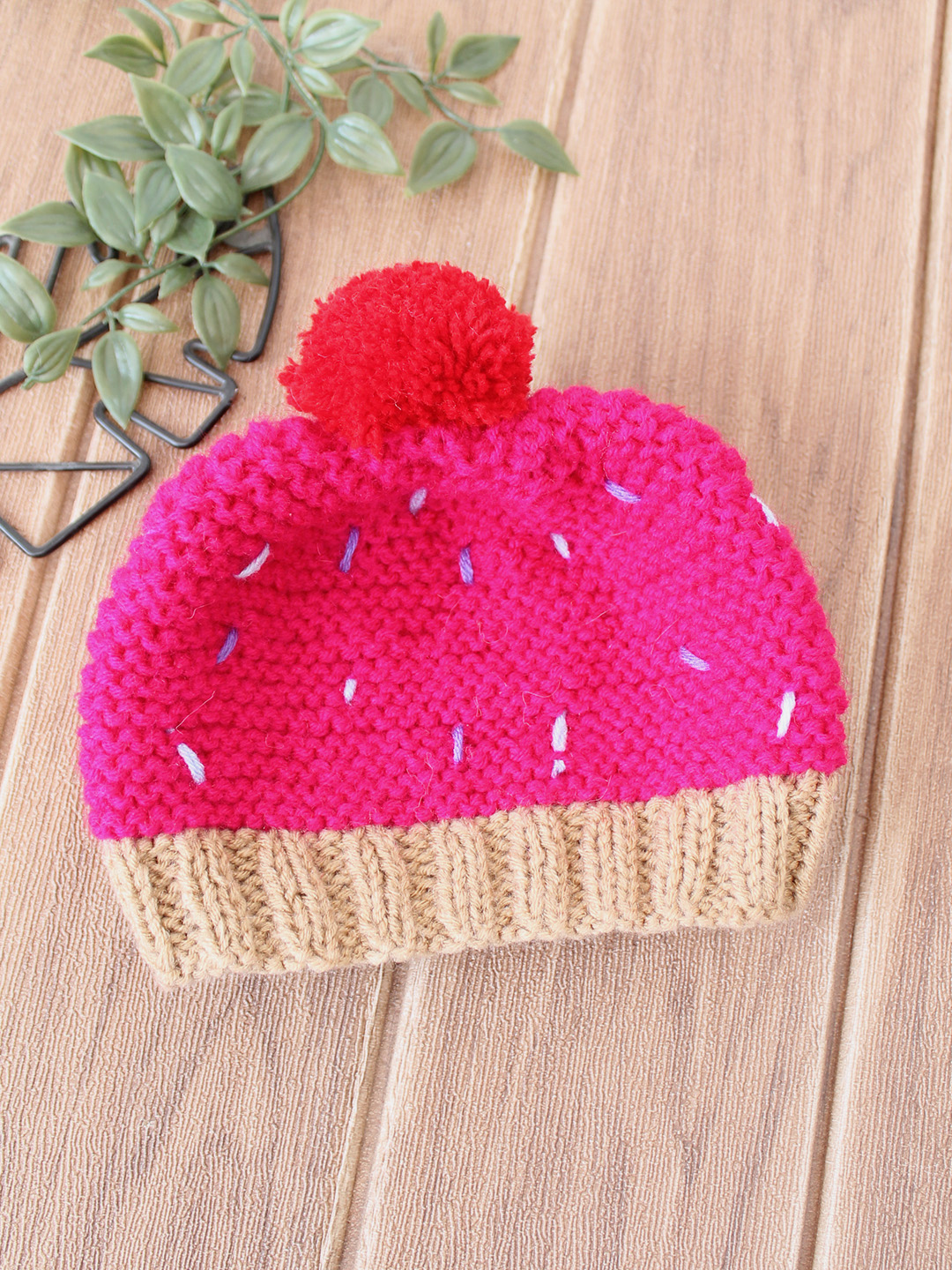 Woonie Handknitted Cupcake with Pom Pom Detailed Cap - Magenta