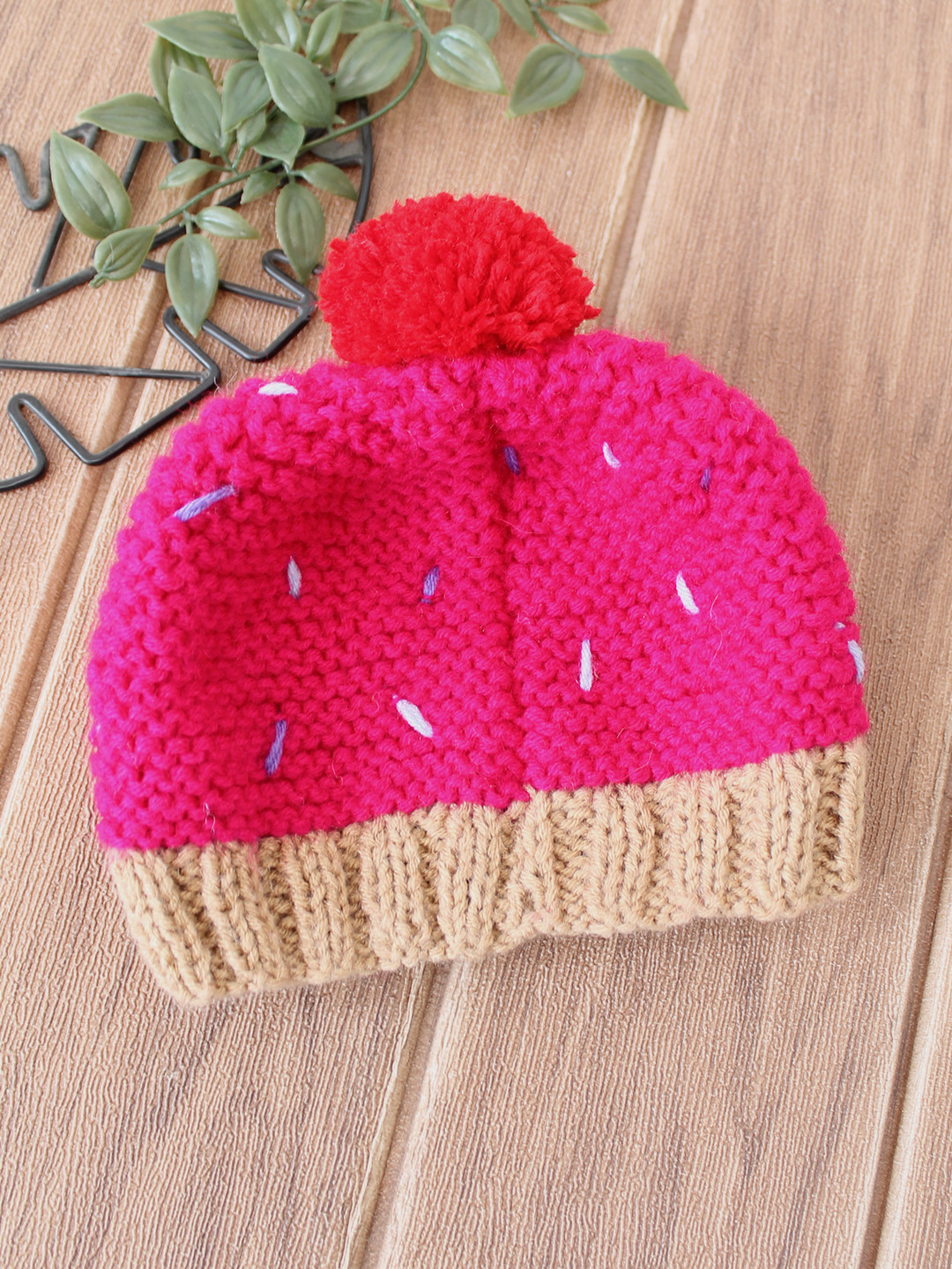 Woonie Handknitted Cupcake with Pom Pom Detailed Cap - Magenta
