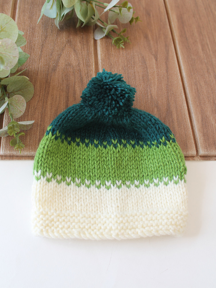 Image of Woonie Handknitted Colorblock with Pom Pom Designed Cap - Multicolor