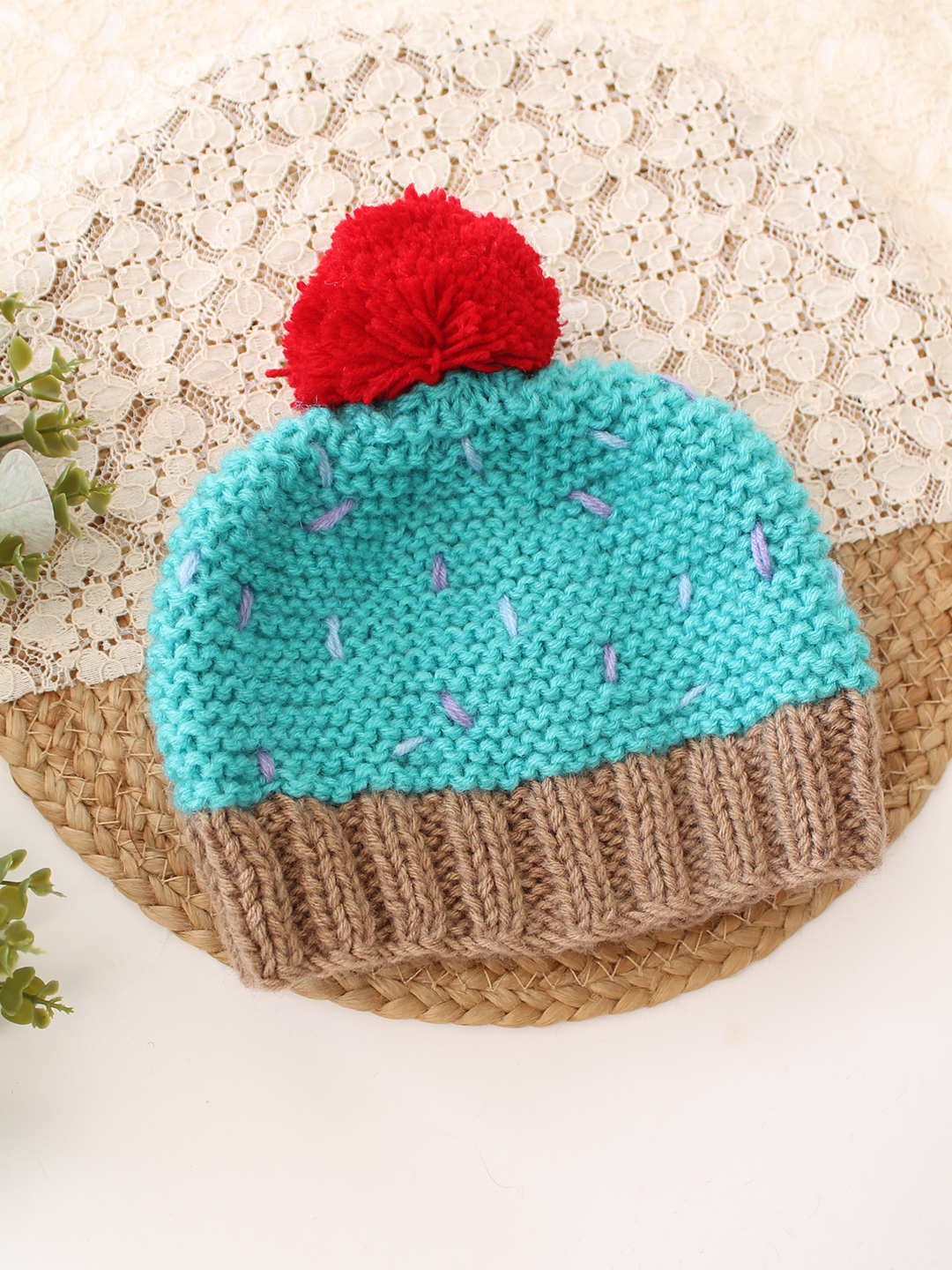Woonie Handknitted Cupcake with Pom Pom Detailed Cap - Sky Blue