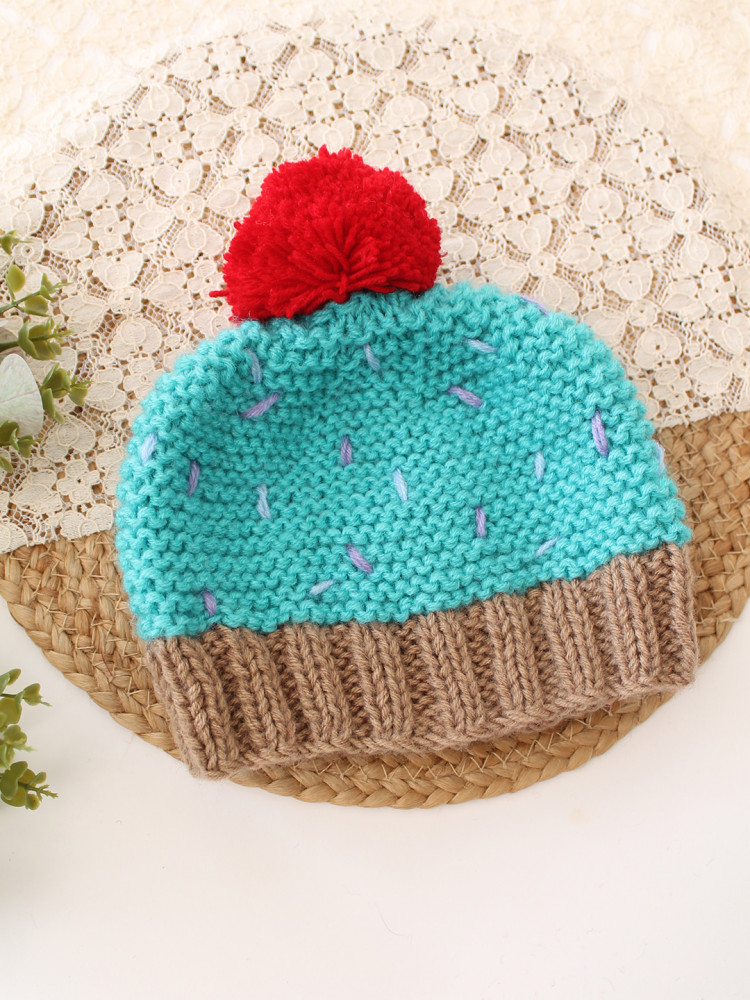 Image of Woonie Handknitted Cupcake with Pom Pom Detailed Cap - Sky Blue