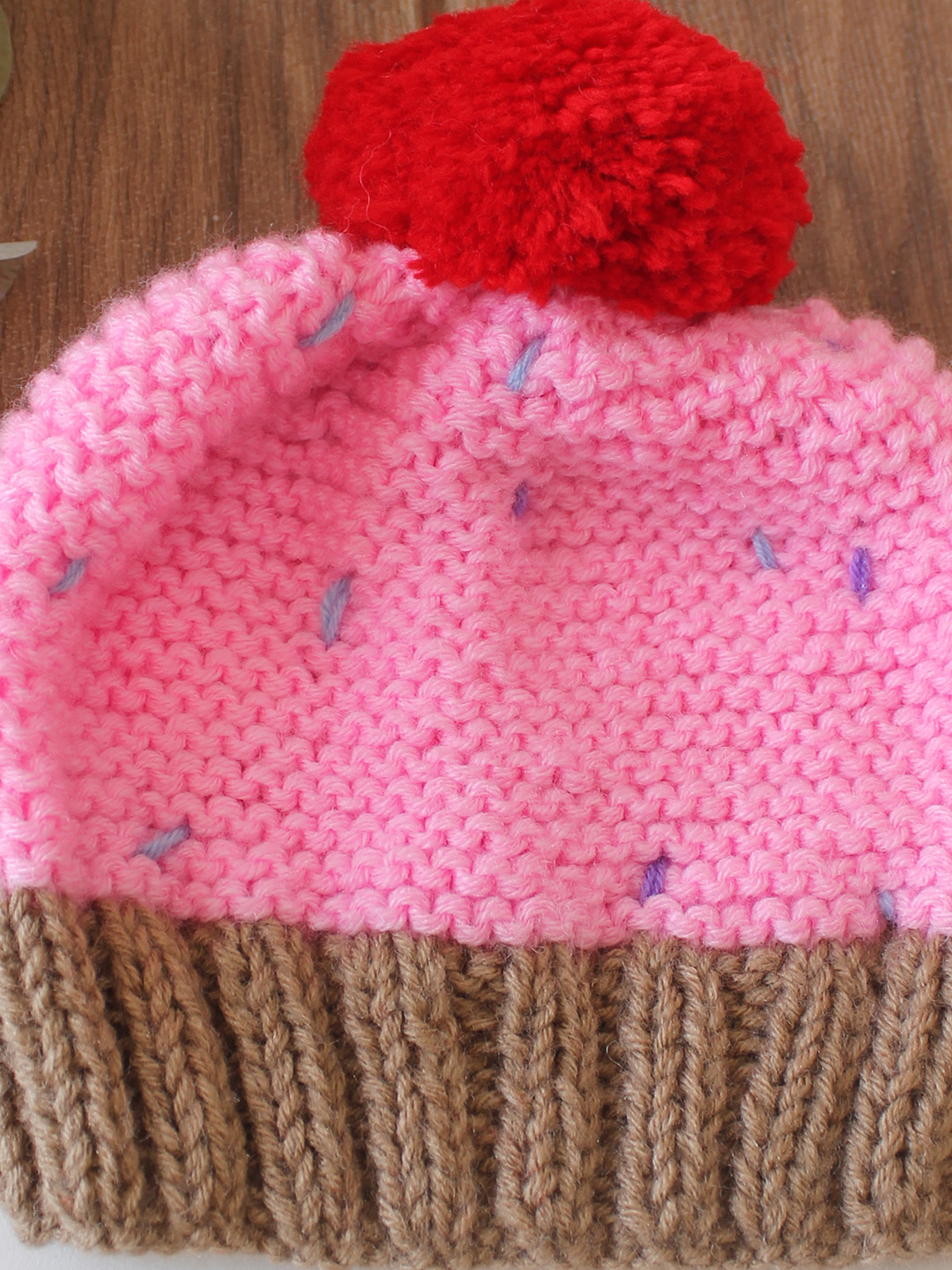 Woonie Handknitted Cupcake with Pom Pom Detailed Cap - Pink