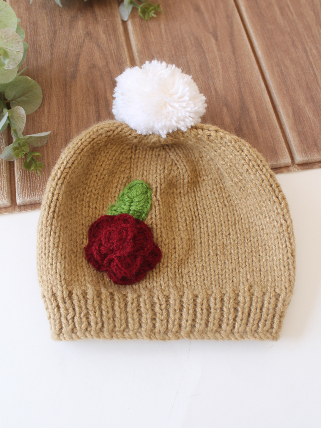 Woonie Handknitted Floral Applique with Pom Pom Designed Cap - Beige