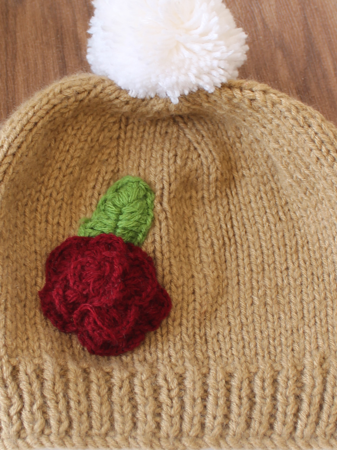 Woonie Handknitted Floral Applique with Pom Pom Designed Cap - Beige