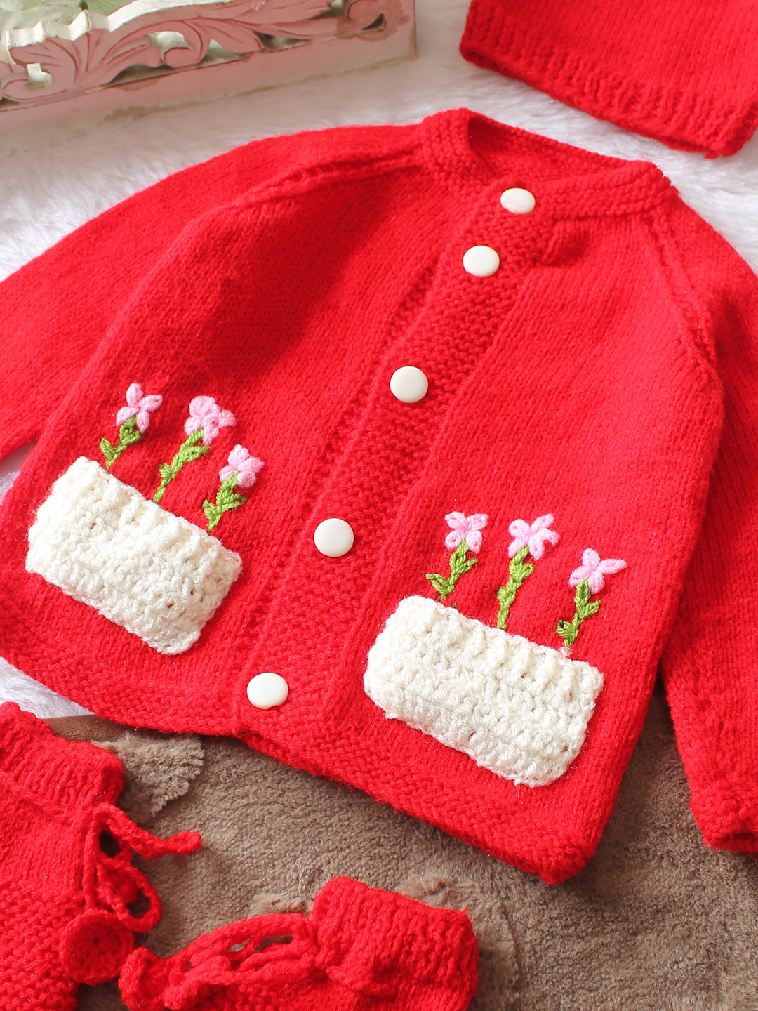 Woonie Handknitted Full Sleeves Floral Embroidered & Pocket Detailed Cardigan with Cap & Socks - Red