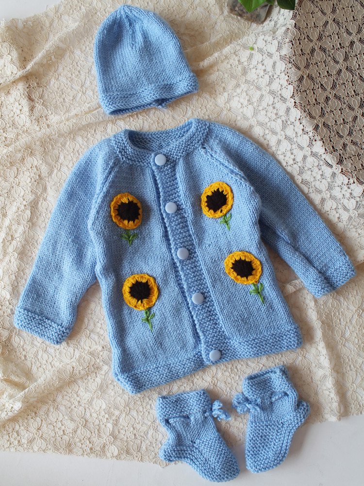 Image of Woonie Handknitted Full Sleeves Sunflower Applique Detailed Cardigan with Cap &amp; socks - Sky Blue