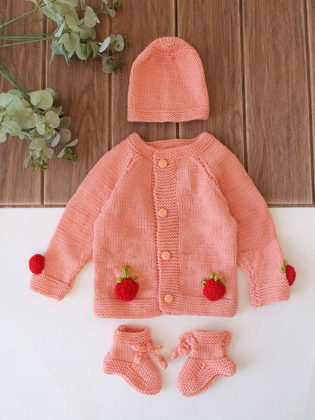 Woonie Handknitted Full Sleeves Floral Appliques Detailed Cardigan with Cap & Socks - Peach