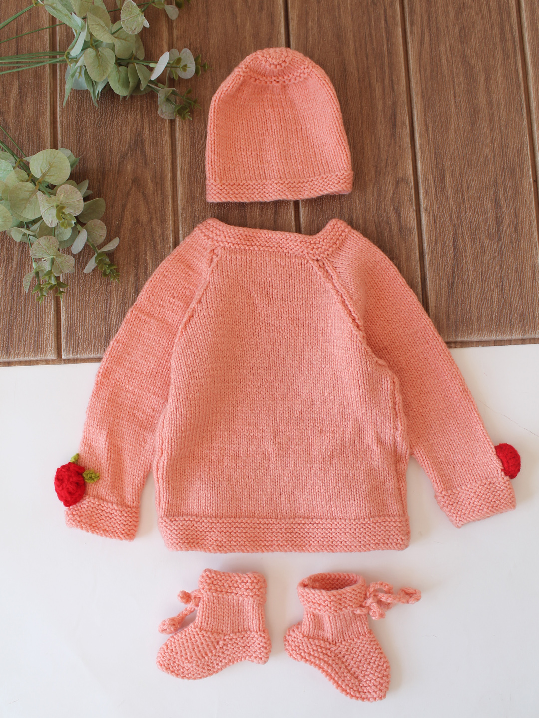 Woonie Handknitted Full Sleeves Floral Appliques Detailed Cardigan with Cap & Socks - Peach
