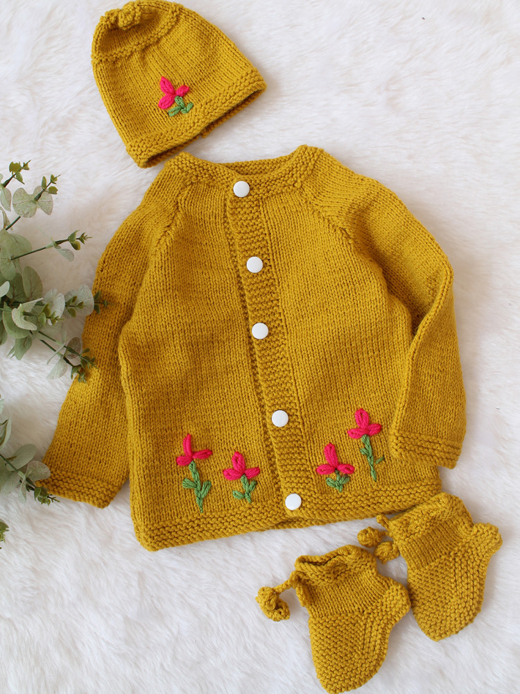 Image of Woonie Handknitted Full Sleeves Floral Embroidered Cardigan with Cap &amp; Socks - Mustard