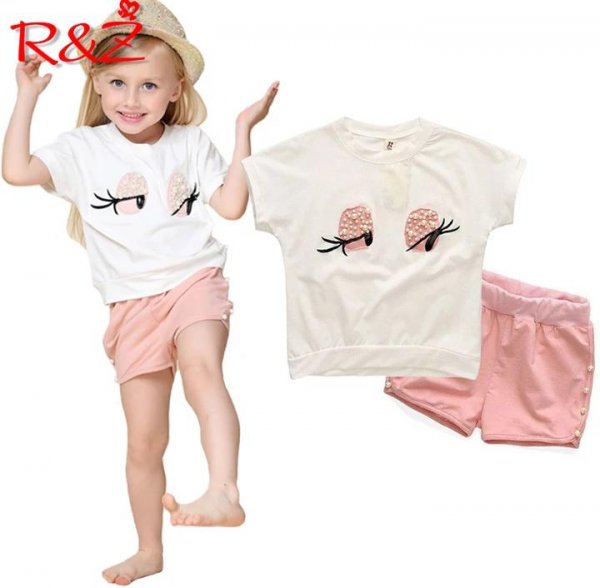Image of Pearl Embellished Beige Shorts With Cream Top