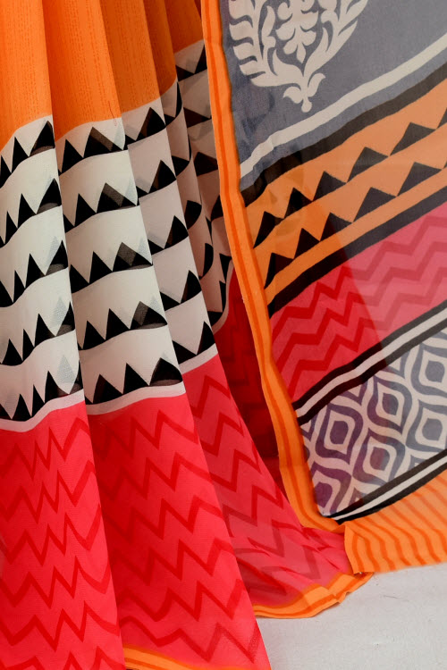 Red-Orange Printed Georgette Saree with Blouse