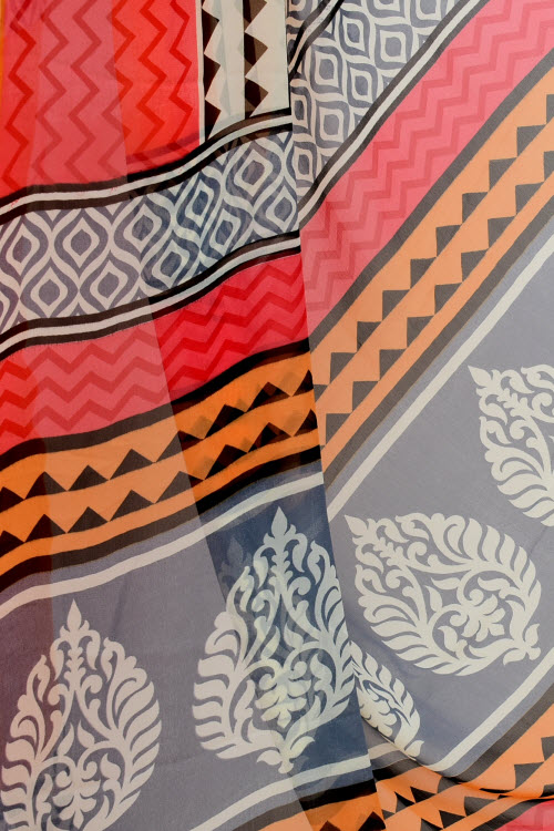 Red-Orange Printed Georgette Saree with Blouse