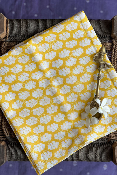 WHITE FLOWER ON YELLOW