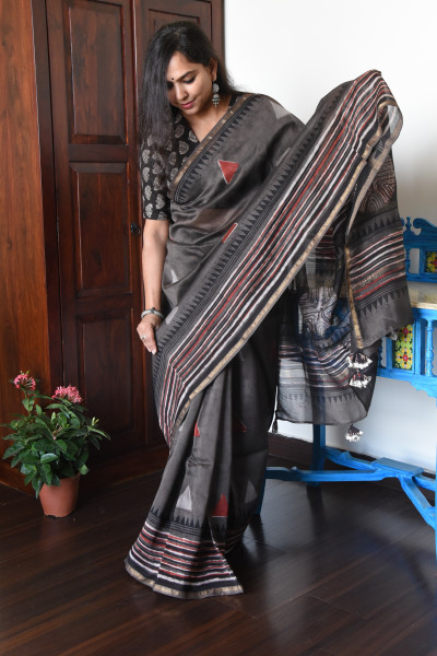 TRIBHUJA