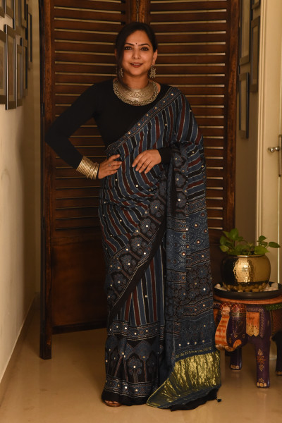 LONG VERTICAL STRIPE BLUE AJRAKH MODAL SILK SAREE WITH MIRROR WORK