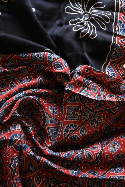FLORAL BLACK ZIG ZAG RED AJRAKH MODAL SILK SAREE WITH MIRROR WORK