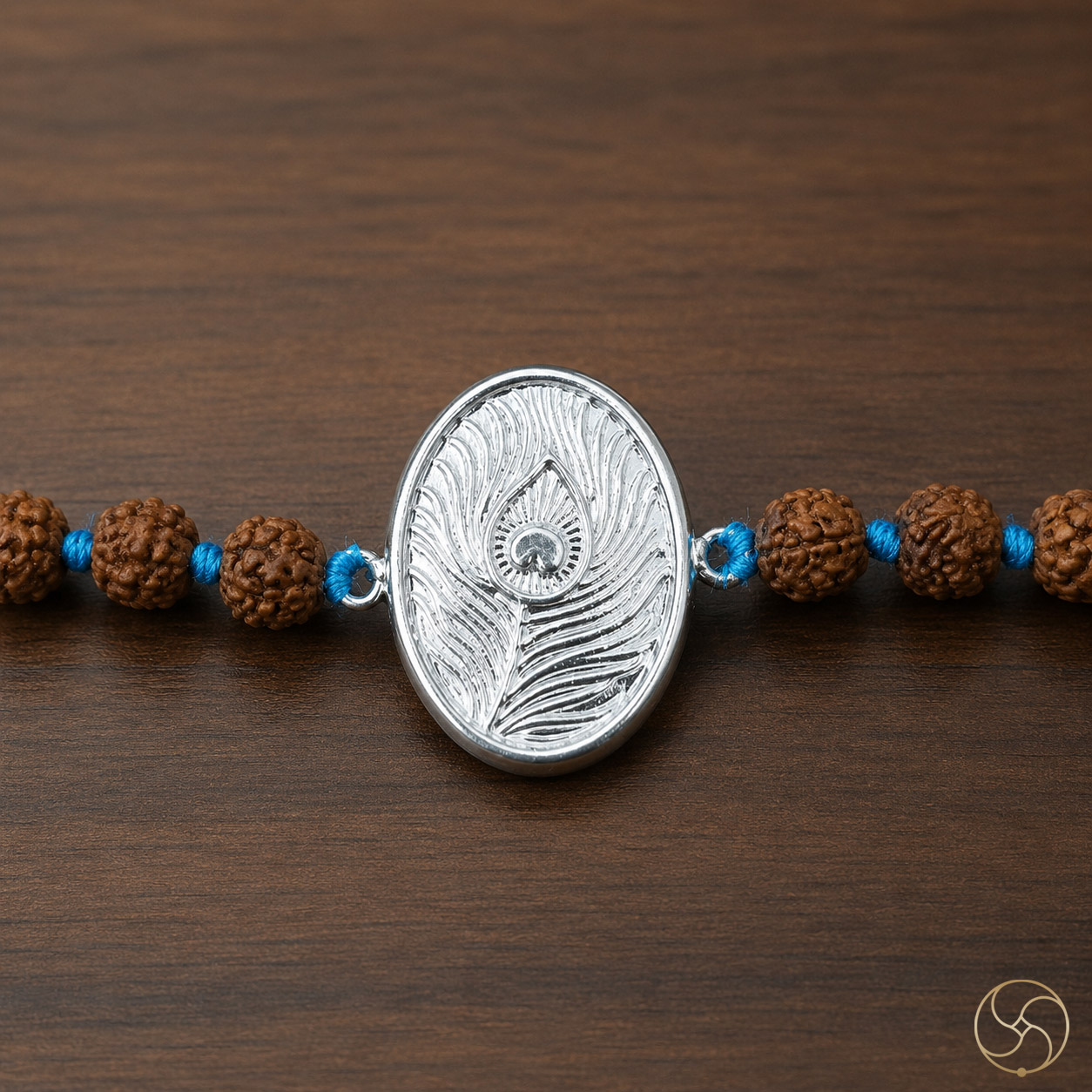 999 Silver Morpankh Charm with Rudraksha Bead Rakhi