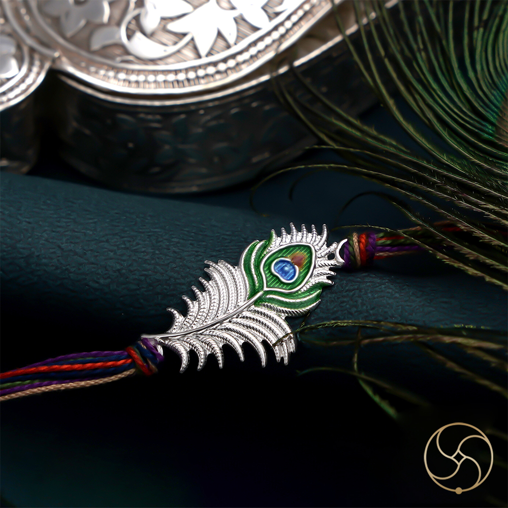 Elegant Grace Peacock Feather Design Silver Rakhi