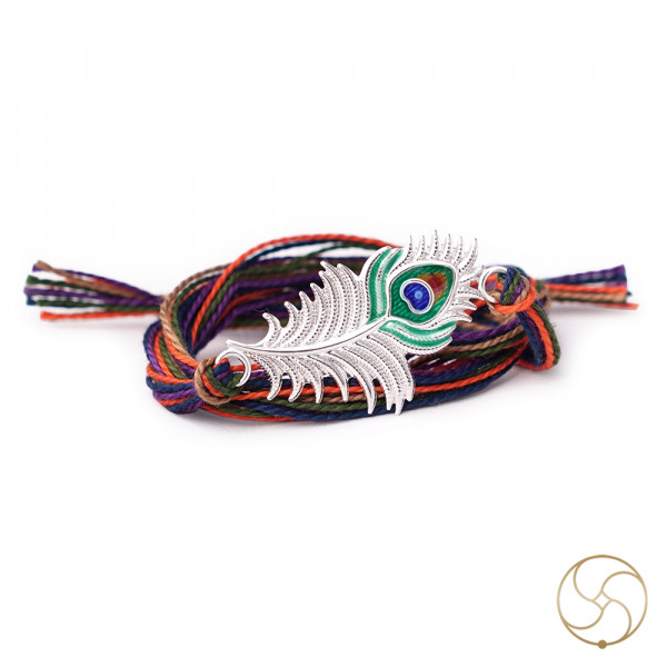 Image of Elegant Grace: Peacock Feather Design Silver Rakhi