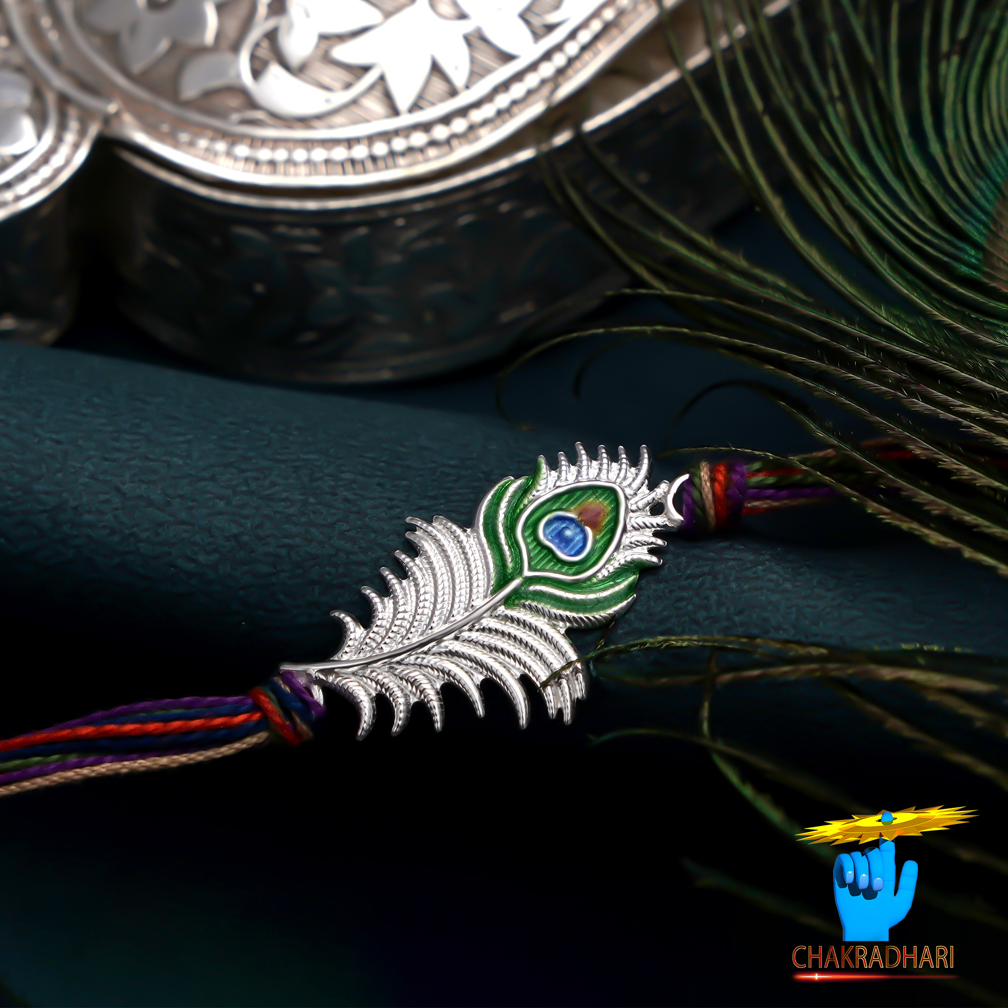 Elegant Grace Peacock Feather Design Silver Rakhi