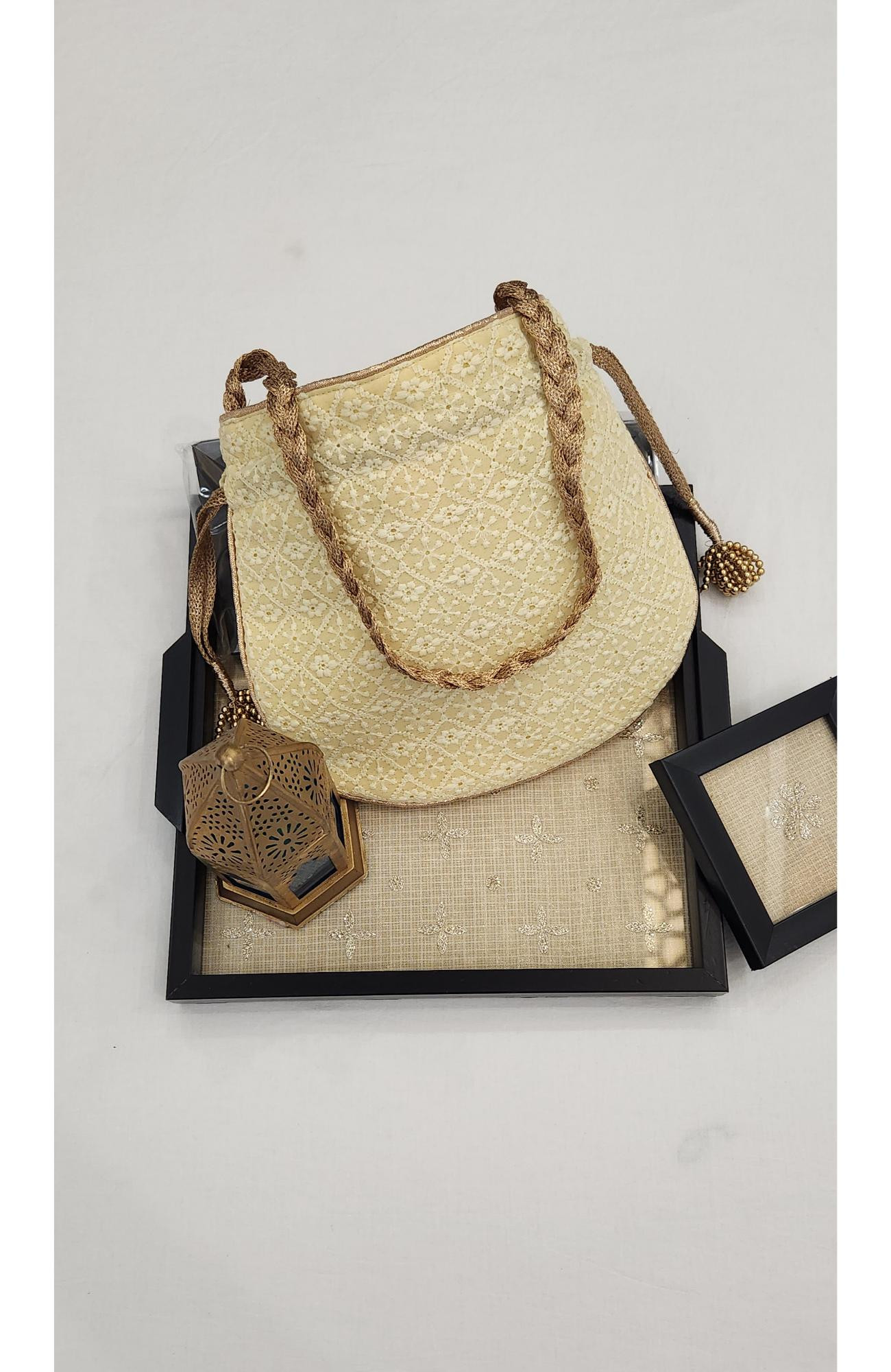 Lemon Yellow Hakuba Potli  Rohia By Chhangamal