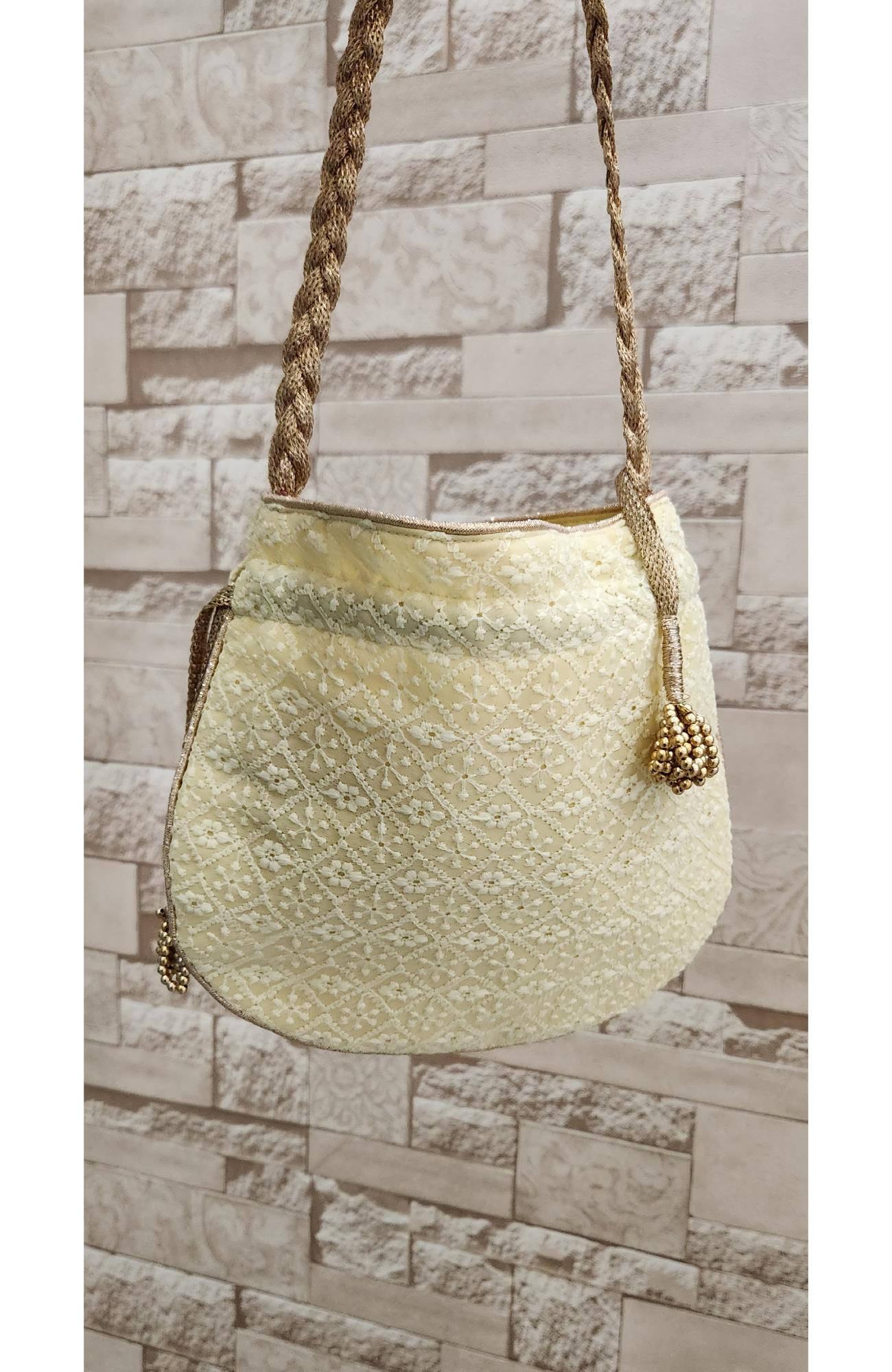 Lemon Yellow Hakuba Potli  Rohia By Chhangamal