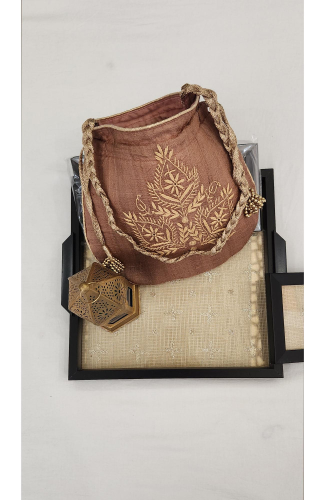 Image of Brown Chikankari Potli Bag in Monga Silk | Rohia By Chhangamal