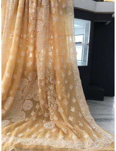Chhangamal Hand Embroidered Peach Colour Georgette Chikankari Saree
