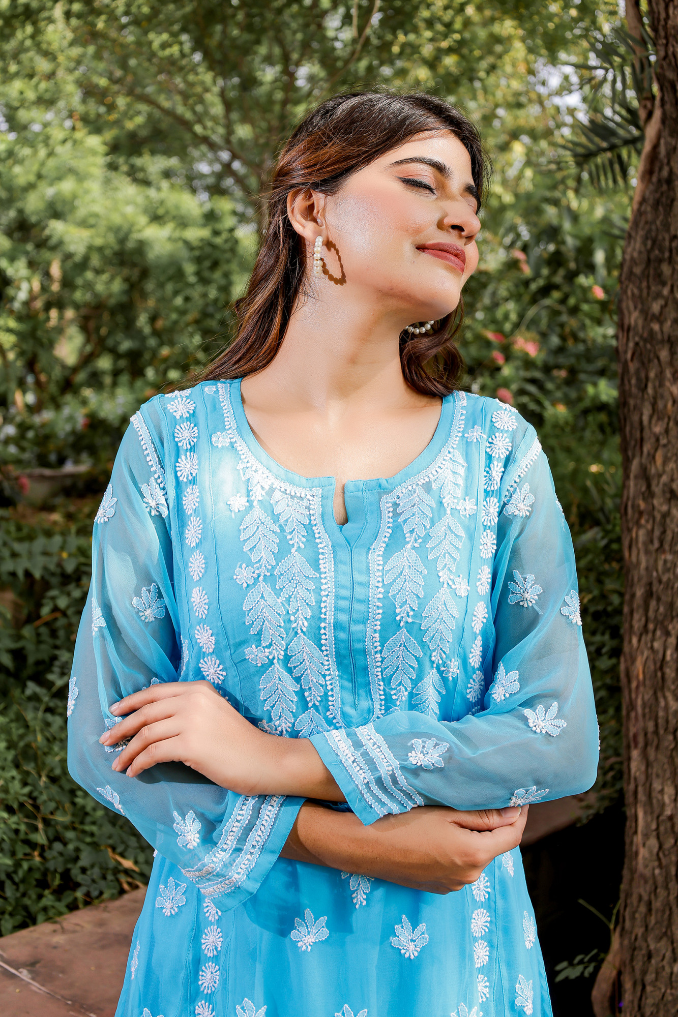 Firozi blue georgette A line Kurta with Front back full hand work