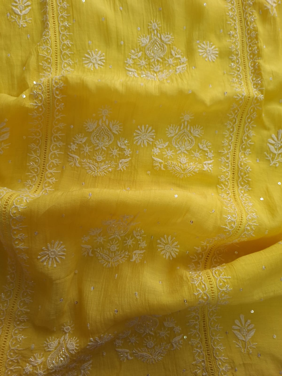 Mango yellow Mul Chanderi set with chikankari and heavy cutdana work