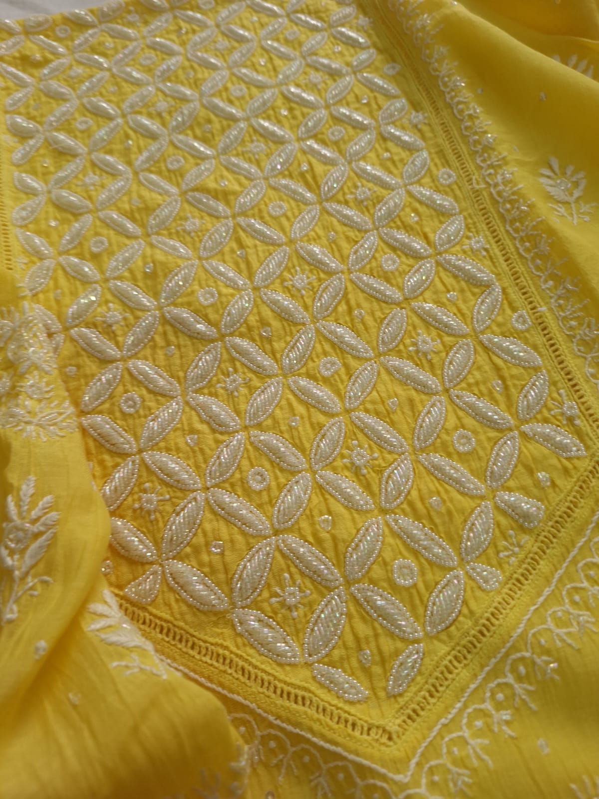 Mango yellow Mul Chanderi set with chikankari and heavy cutdana work