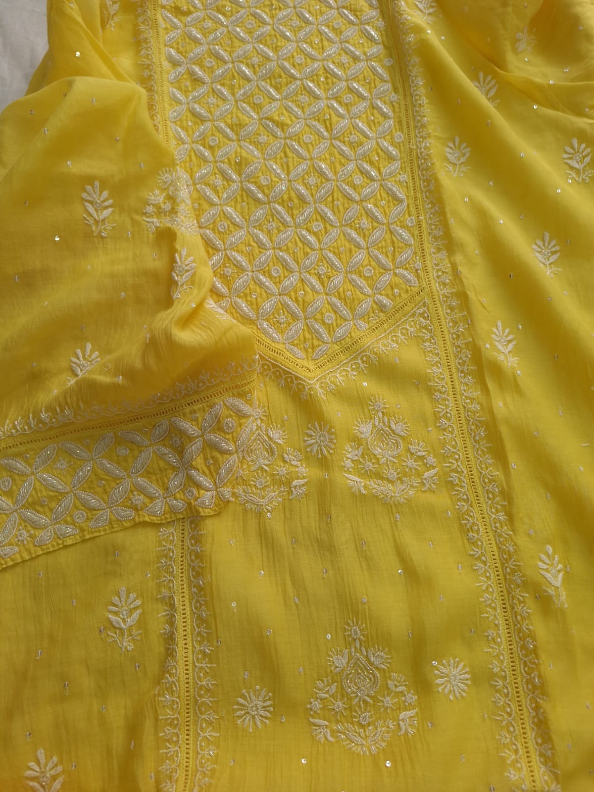 Mango yellow Mul Chanderi set with chikankari and heavy cutdana work