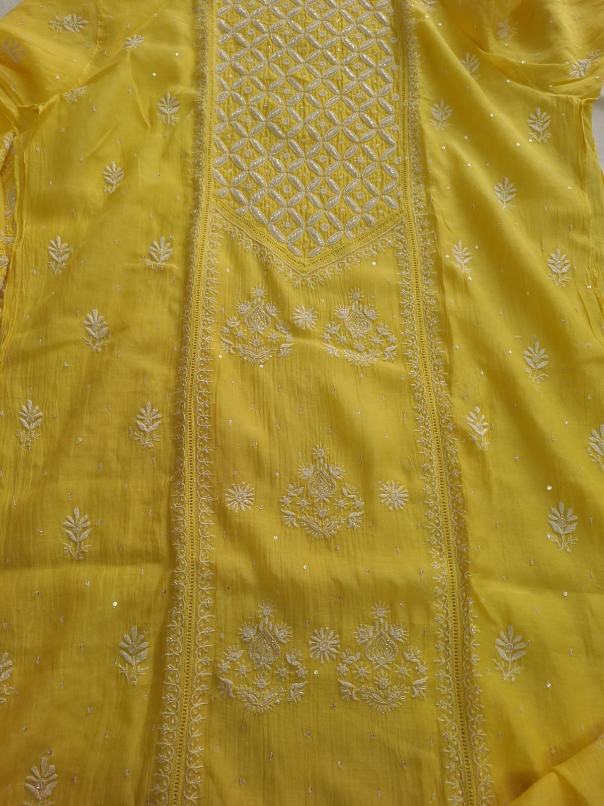 Mango yellow Mul Chanderi set with chikankari and heavy cutdana work